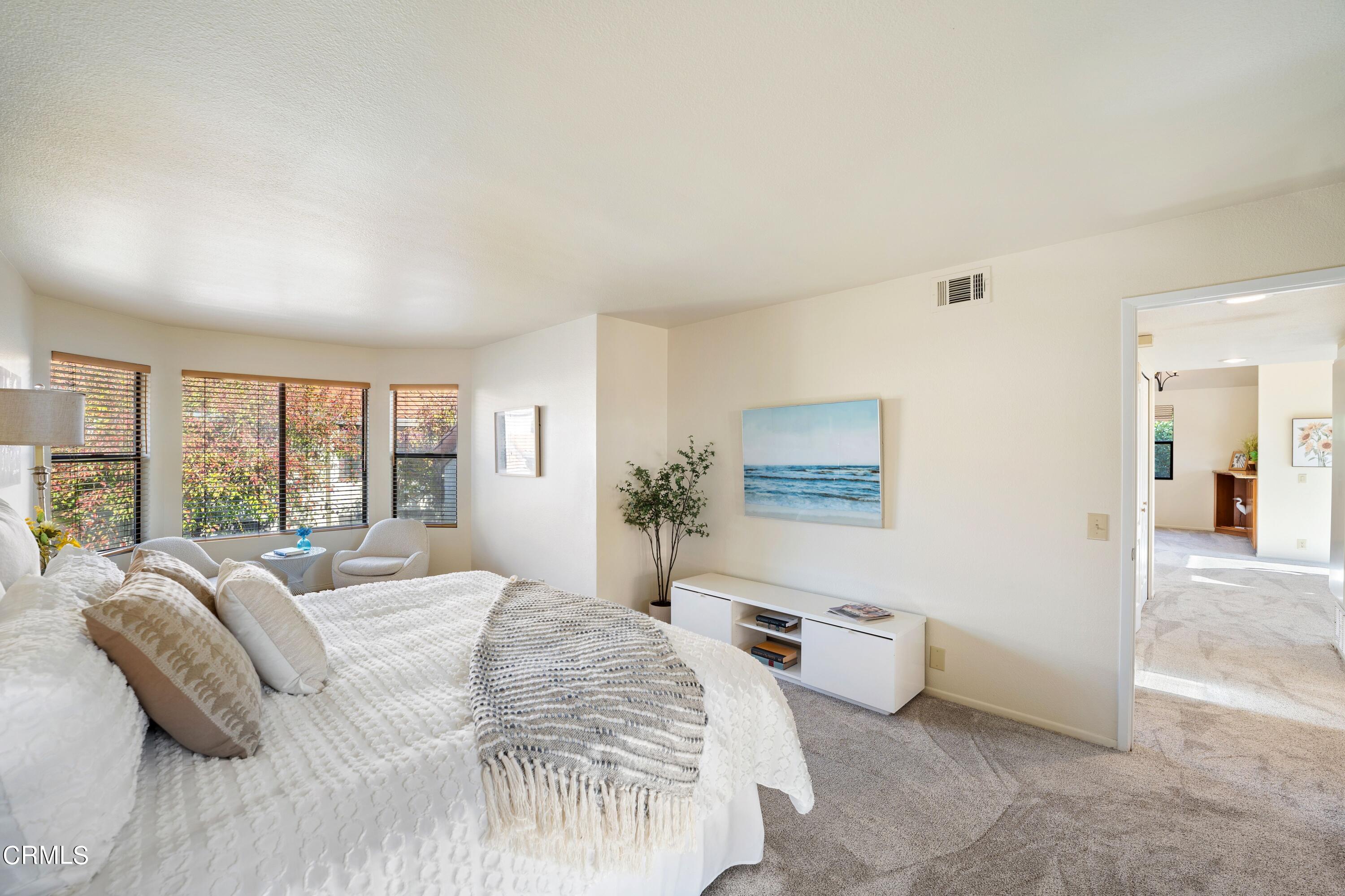 2041 Majorca Drive Oxnard, CA 93035 - Photo 19 of 31 a bedroom with a bed and a large window