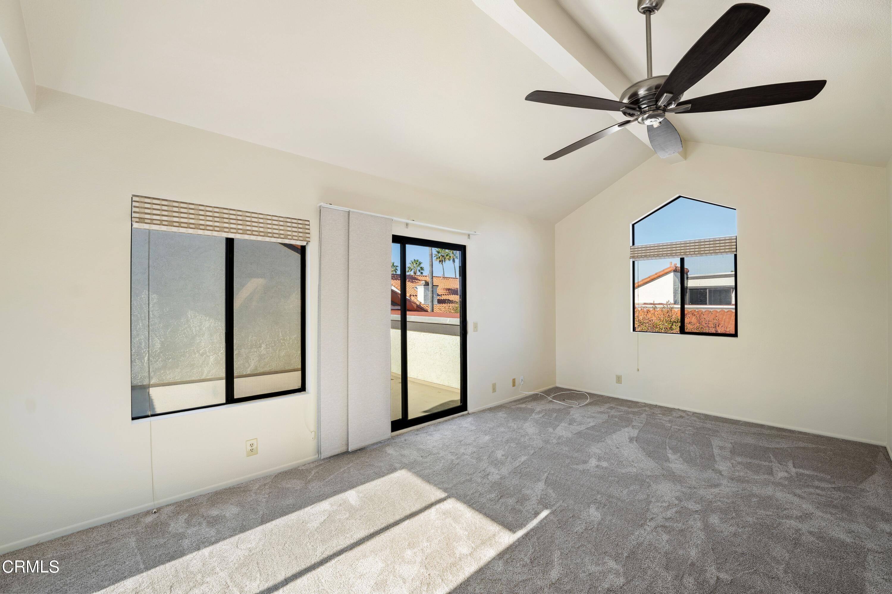 2041 Majorca Drive Oxnard, CA 93035 - Photo 22 of 31 an empty room with windows and fan