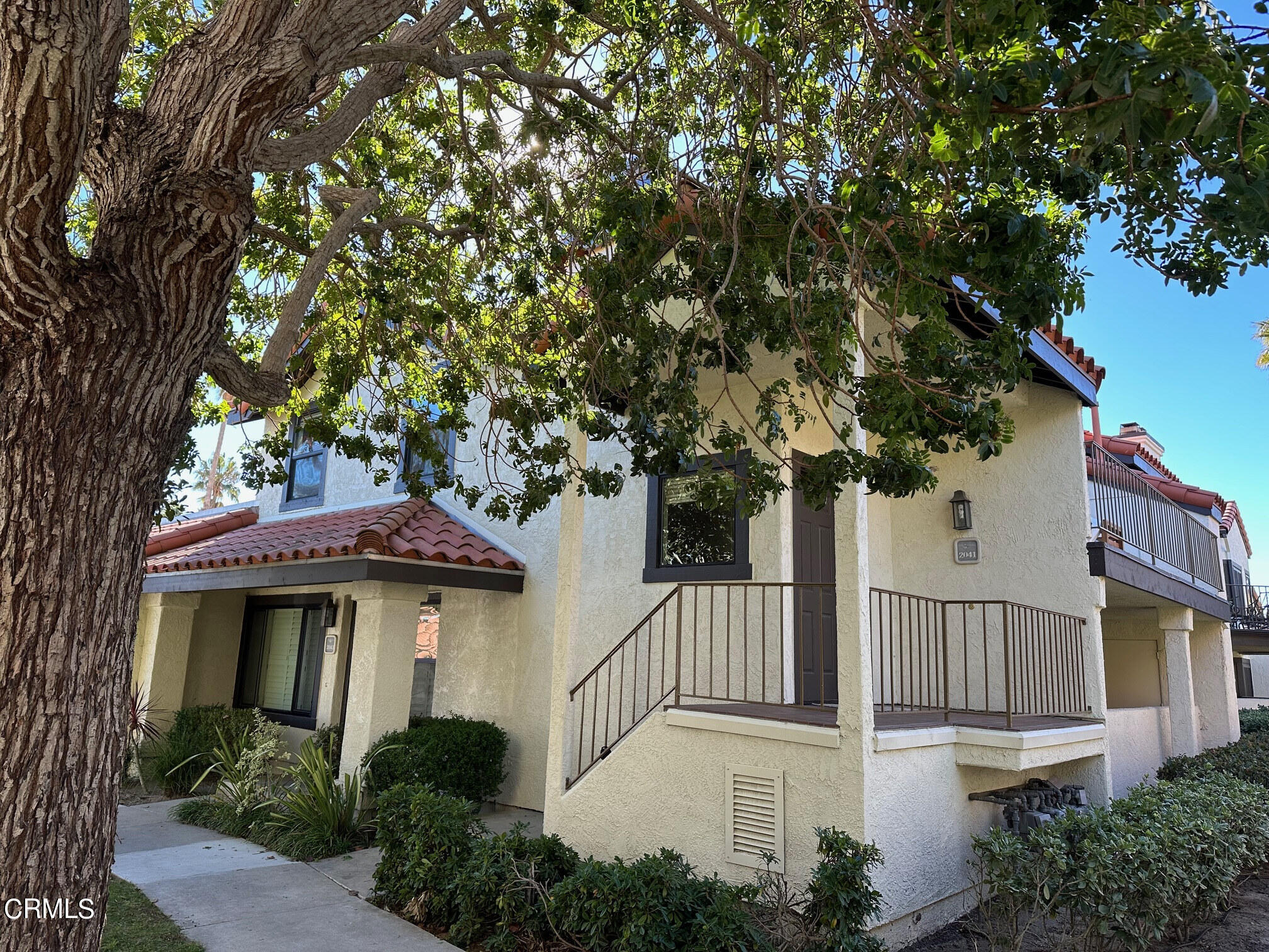 2041 Majorca Drive Oxnard, CA 93035 - Photo 4 of 31 a view of a house with a tree