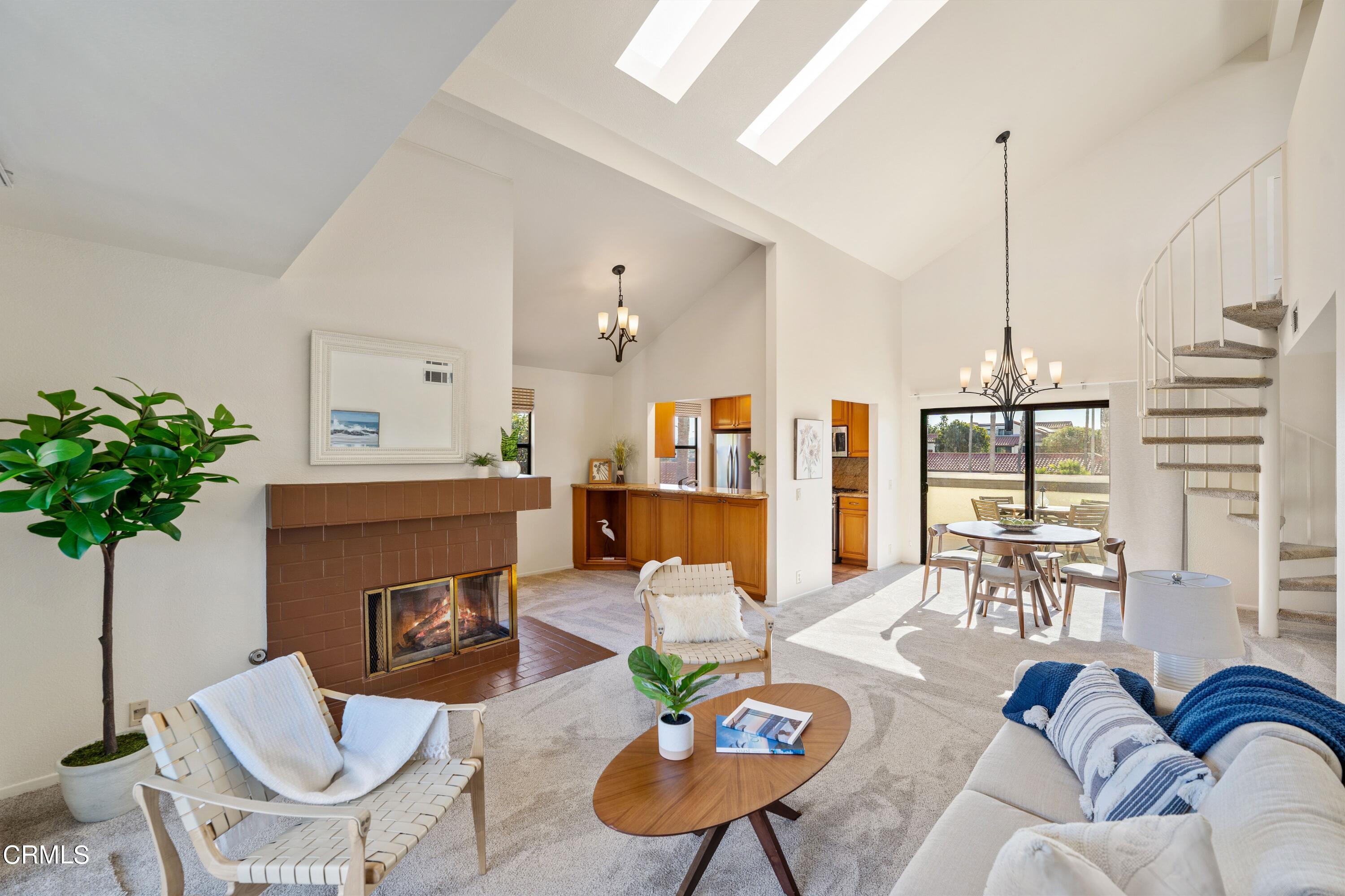 2041 Majorca Drive Oxnard, CA 93035 - Photo 7 of 31 a living room with furniture fireplace and a potted plant