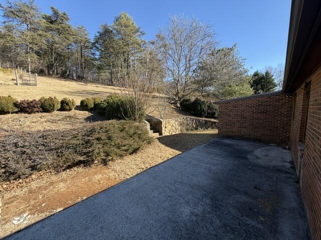 1650 Haymakertown Road Fincastle, VA 24090 - Photo 2 of 21 a view of a yard with wooden fence