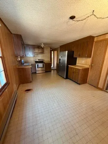 a view of kitchen and furniture