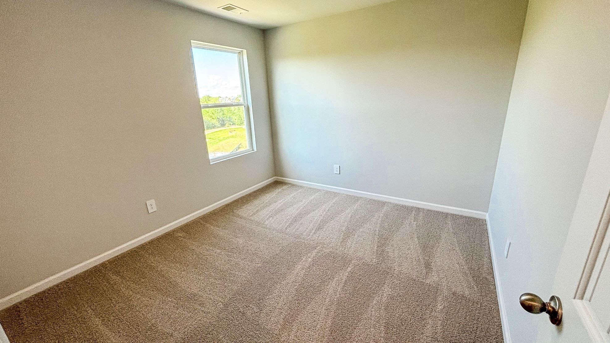 323 Carp Court Antioch, TN 37013 - Photo 22 of 27 a view of an empty room with a window