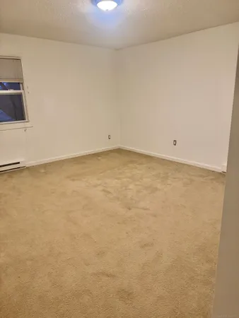 a view of a room with an empty space