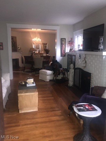 276 Merriman Road Akron, OH 44303 - Photo 5 of 24 Living Room w/ Built in Bookshelves, Fireplace, Wood Floors