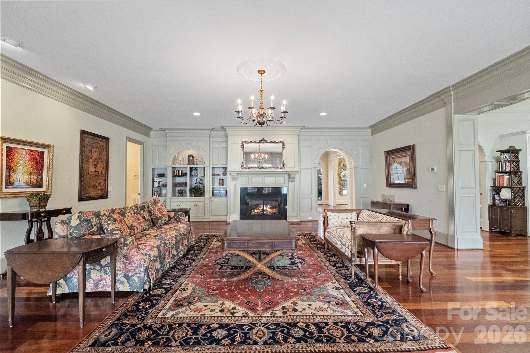 393 Youngs Bend Road Kershaw, SC 29067 - Photo 12 of 48 a living room with furniture and a chandelier