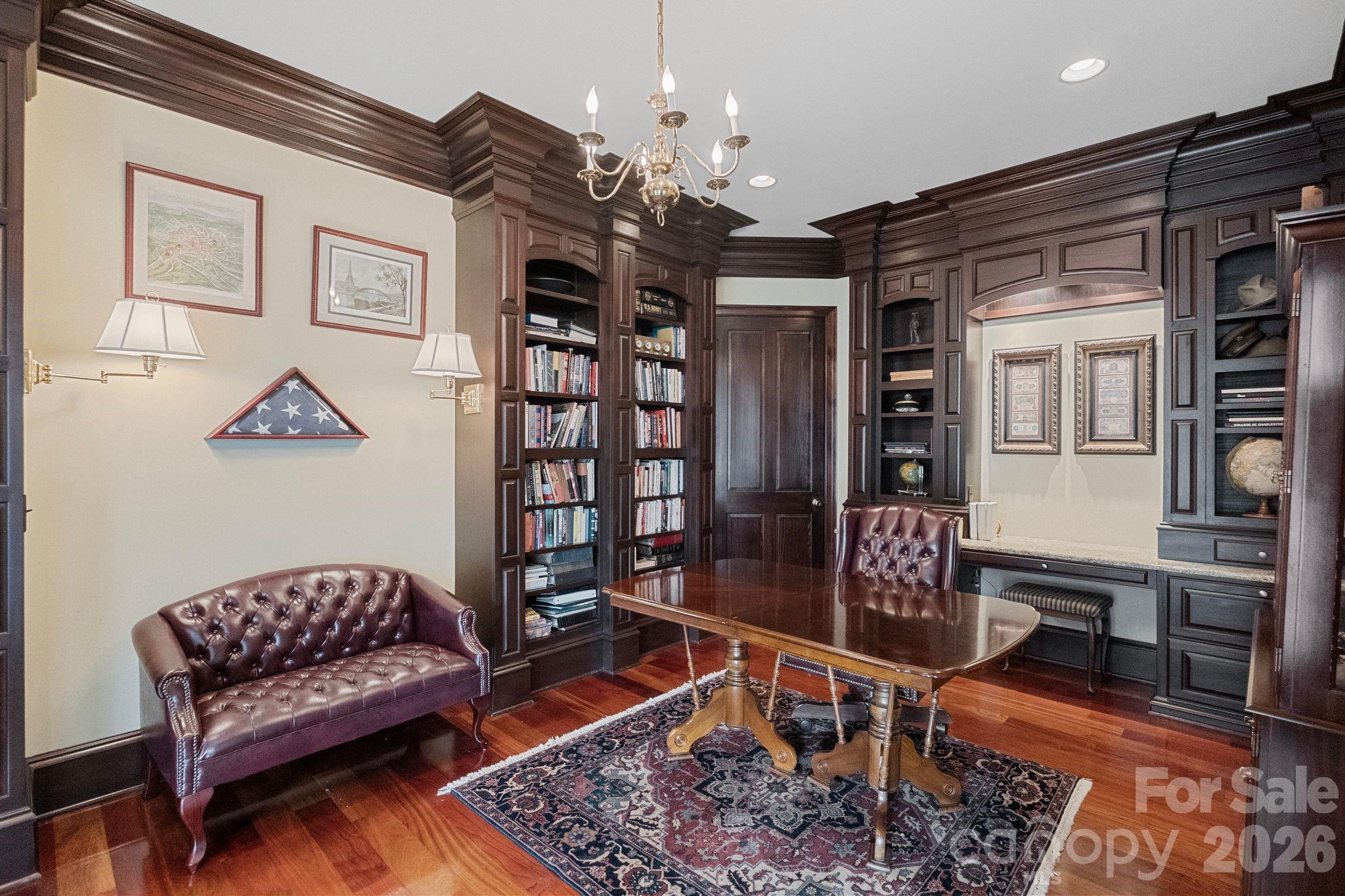 393 Youngs Bend Road Kershaw, SC 29067 - Photo 18 of 48 a living room with furniture a dining table and a chandelier
