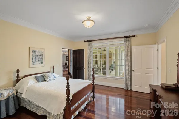 a view of a house with backyard porch and sitting area