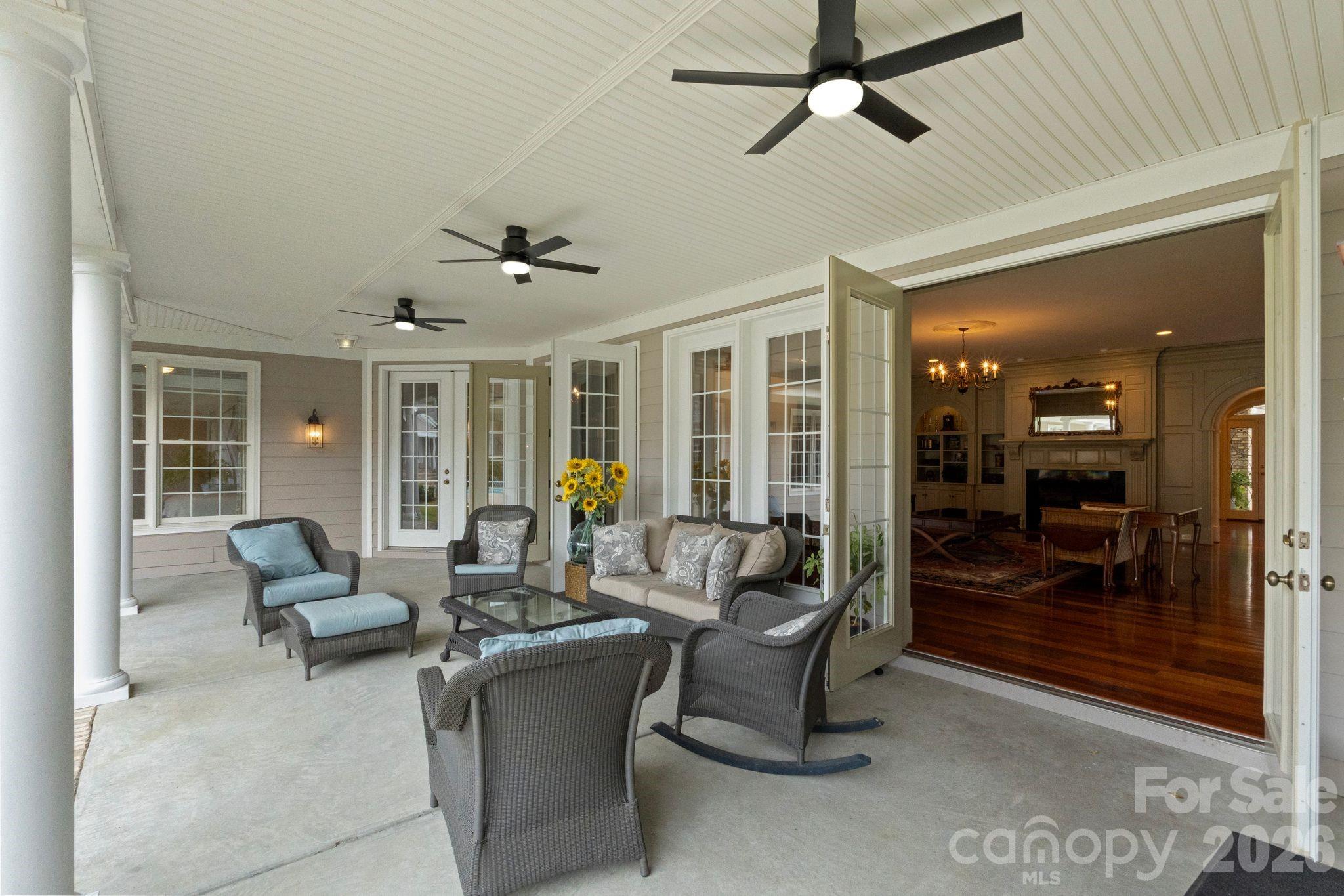 393 Youngs Bend Road Kershaw, SC 29067 - Photo 28 of 48 a living room with furniture and a glass door shower