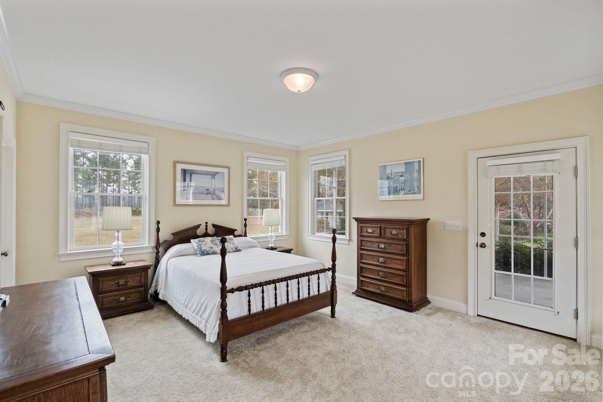 393 Youngs Bend Road Kershaw, SC 29067 - Photo 33 of 48 a bedroom with a bed and a window