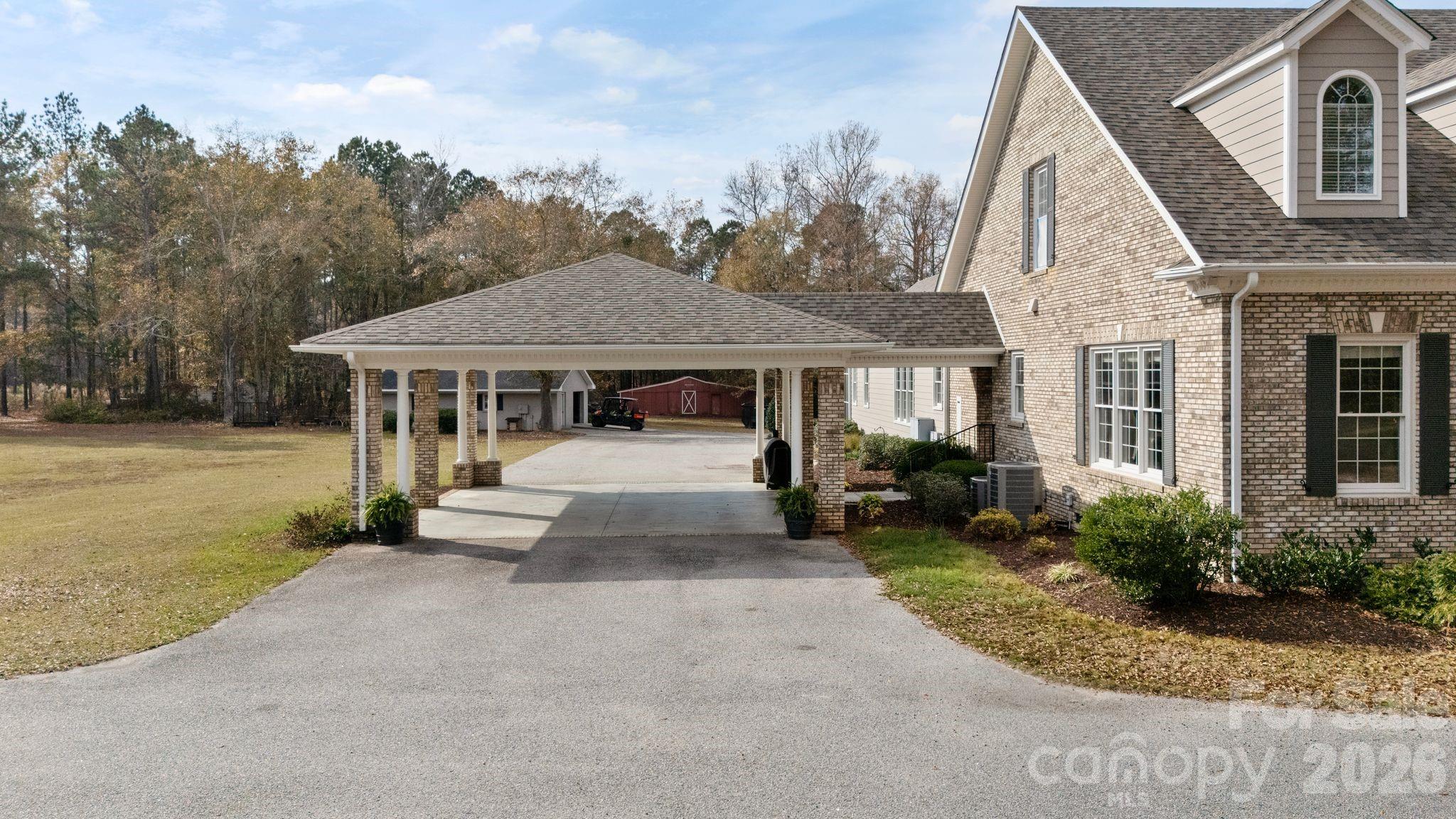 393 Youngs Bend Road Kershaw, SC 29067 - Photo 44 of 48 a view of a house with backyard porch and sitting area