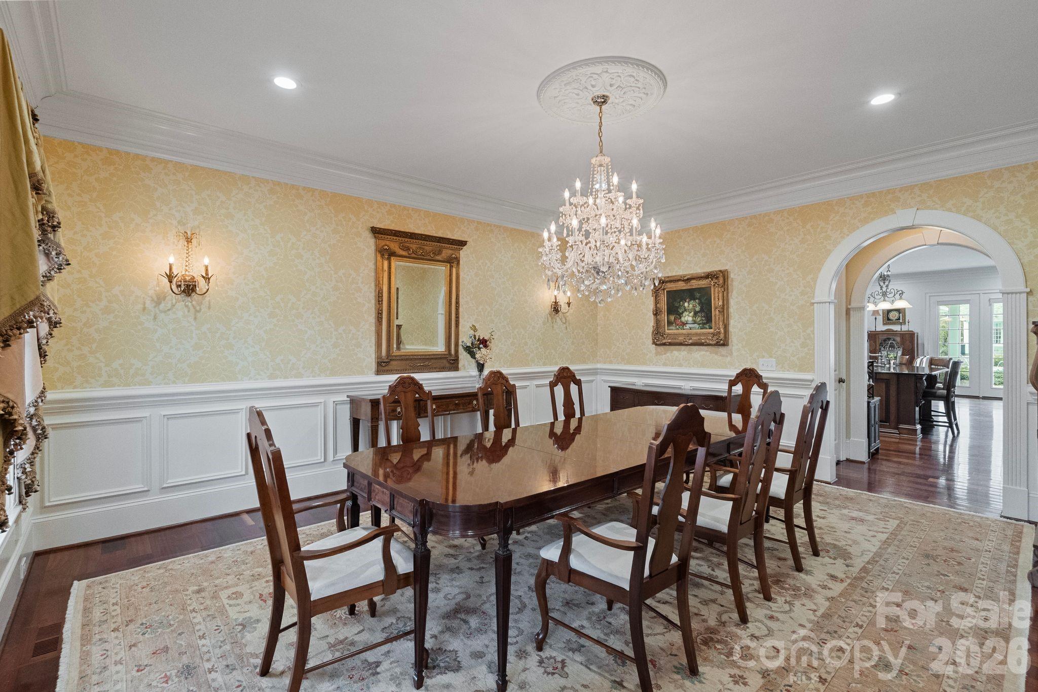 393 Youngs Bend Road Kershaw, SC 29067 - Photo 8 of 48 a view of a dining room with furniture and chandelier