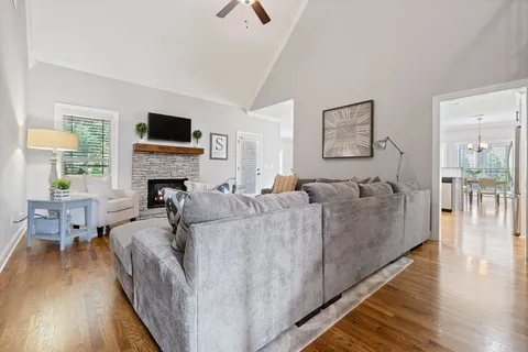 a kitchen with lots of counter space and wooden floor