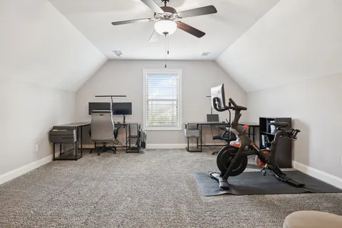 a view of yard with swimming pool and green space