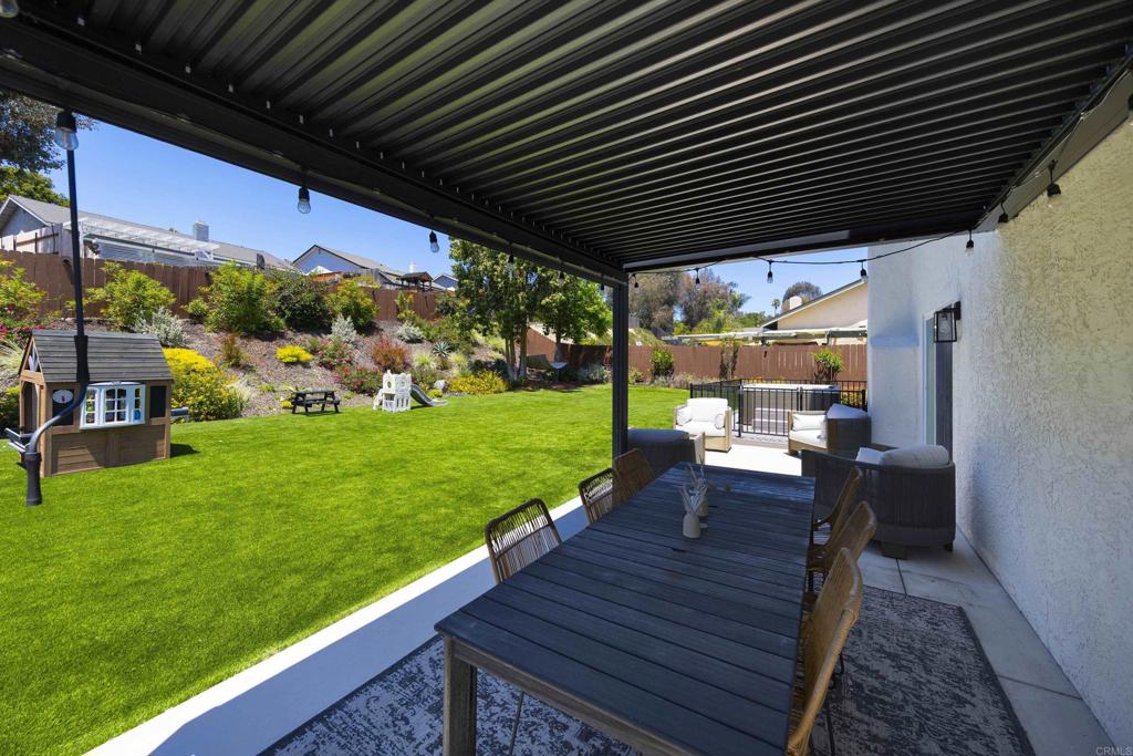 3577 Winslow Road Oceanside, CA 92056 - Photo 36 of 53 a view of yard from deck with patio