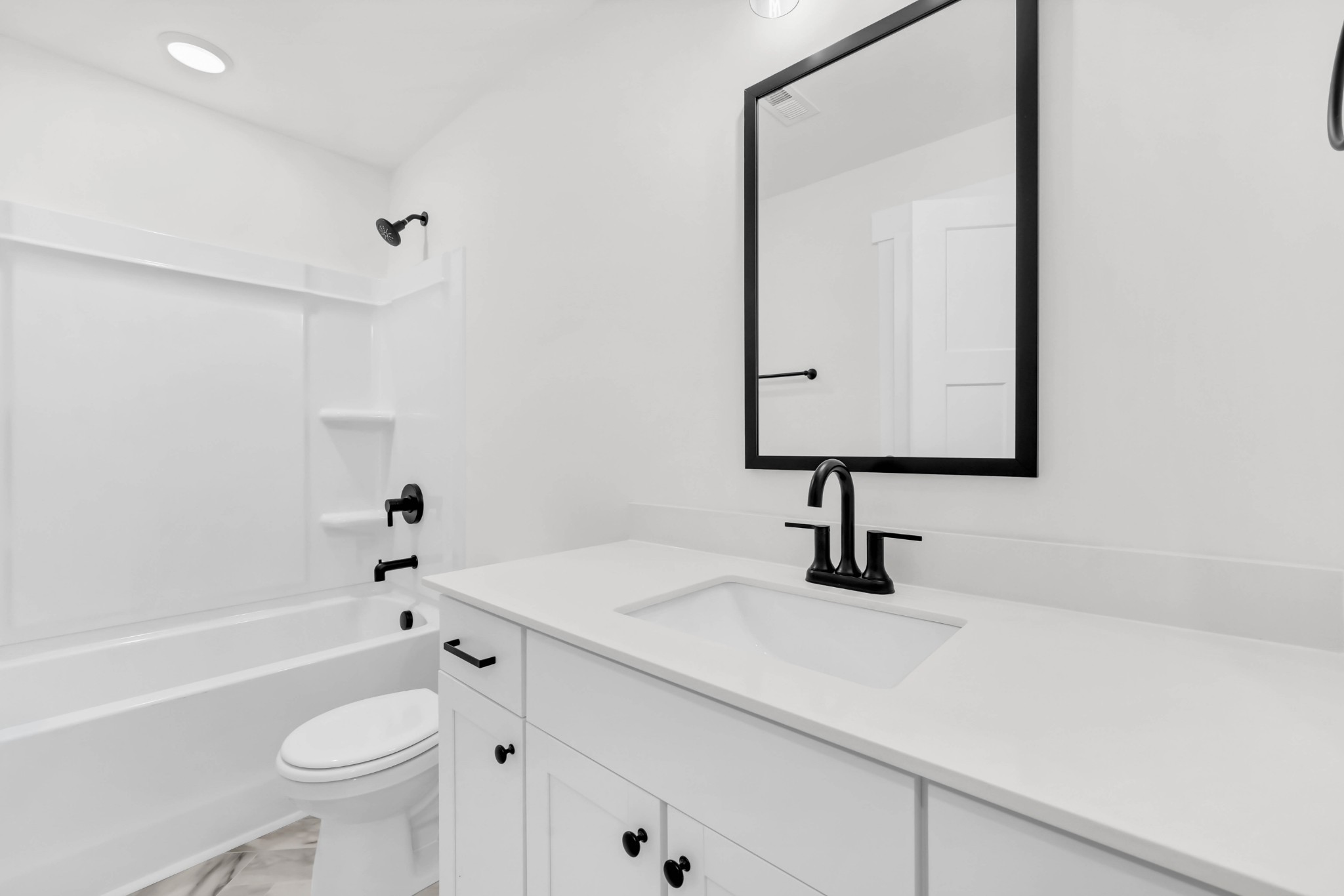 180 Clay Ridge Drive, Unit A4 Clarksville, TN 37040 - Photo 19 of 26 a bathroom with a sink a toilet and a mirror