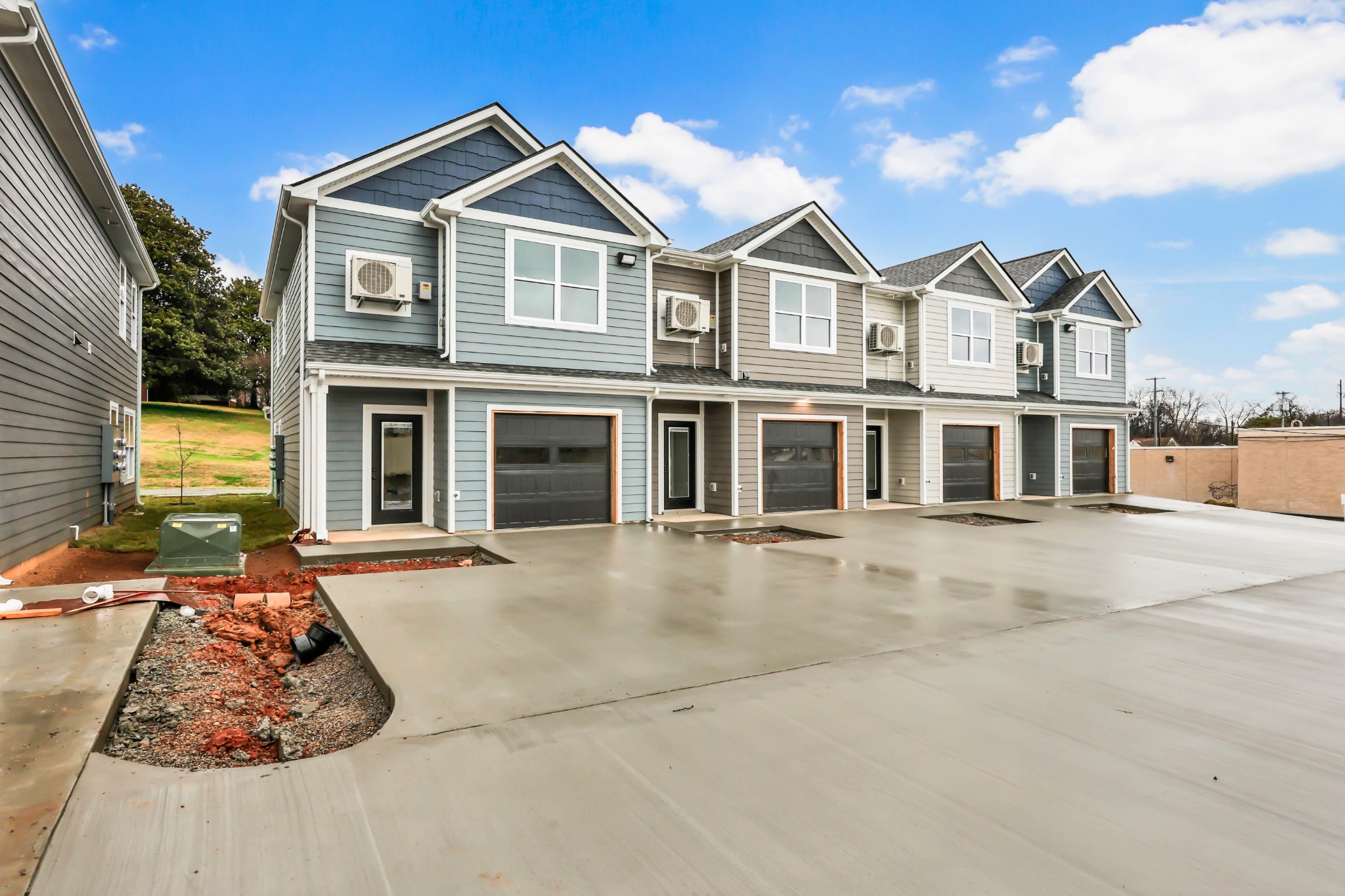 180 Clay Ridge Drive, Unit A4 Clarksville, TN 37040 - Photo 26 of 26 a front view of a house with yard and parking