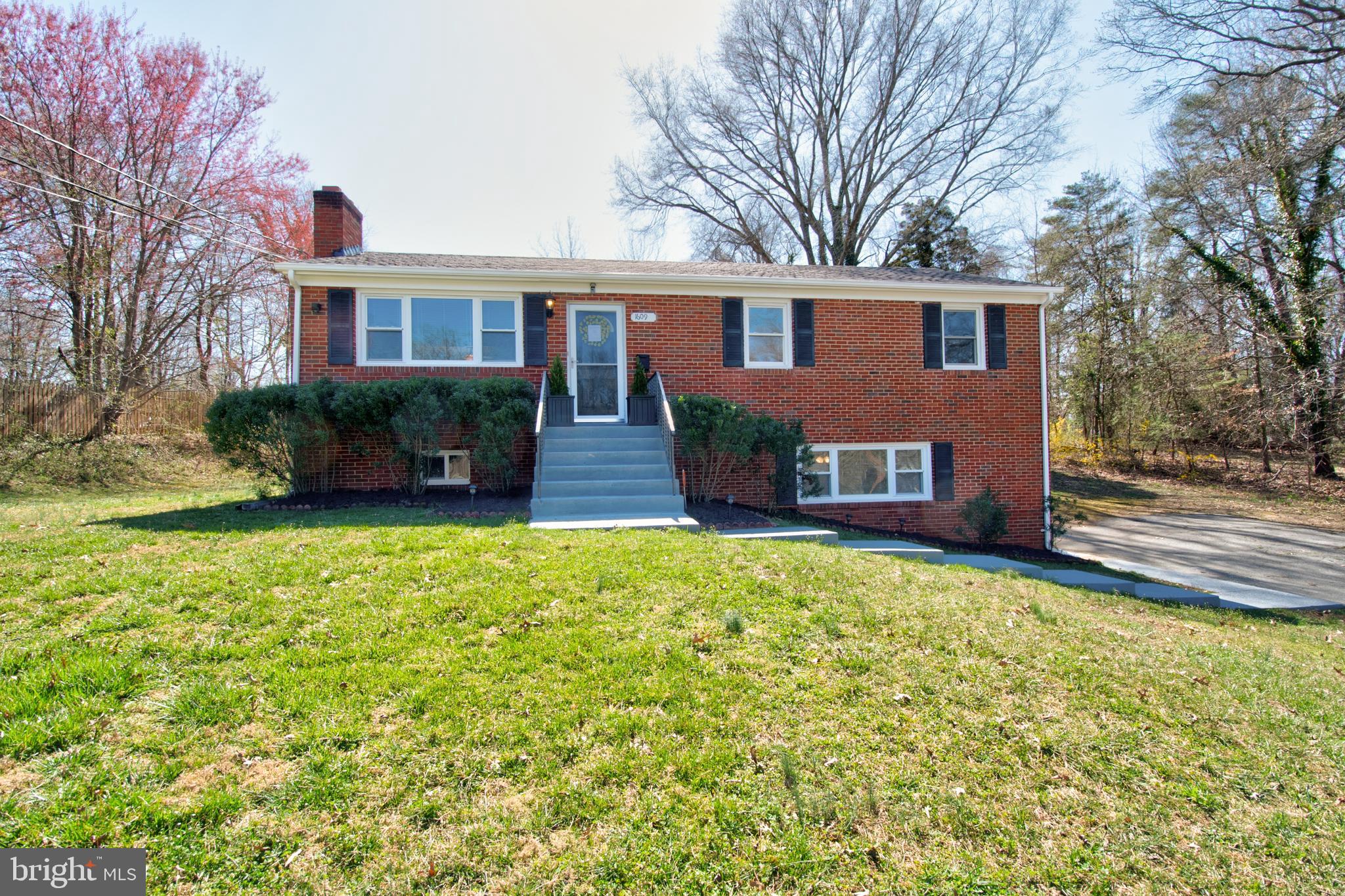 1609 Thomas Road Fort Washington, MD 20744 - Photo 1 of 27 Brick front fresh landscape