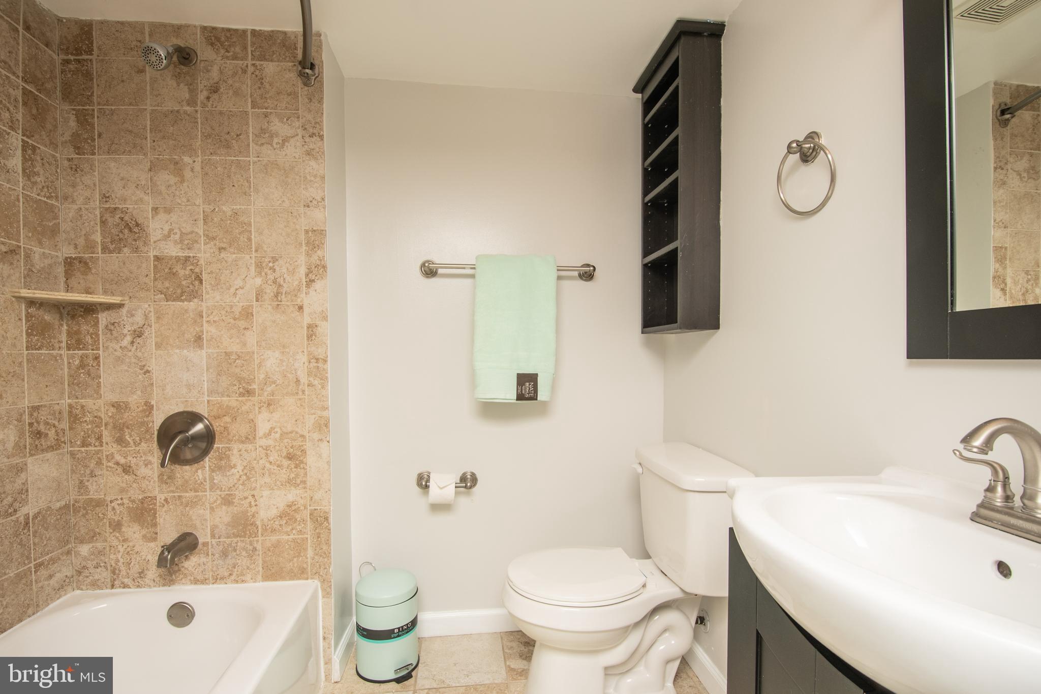 1609 Thomas Road Fort Washington, MD 20744 - Photo 18 of 27 Updated bathroom in lower level with tile surround