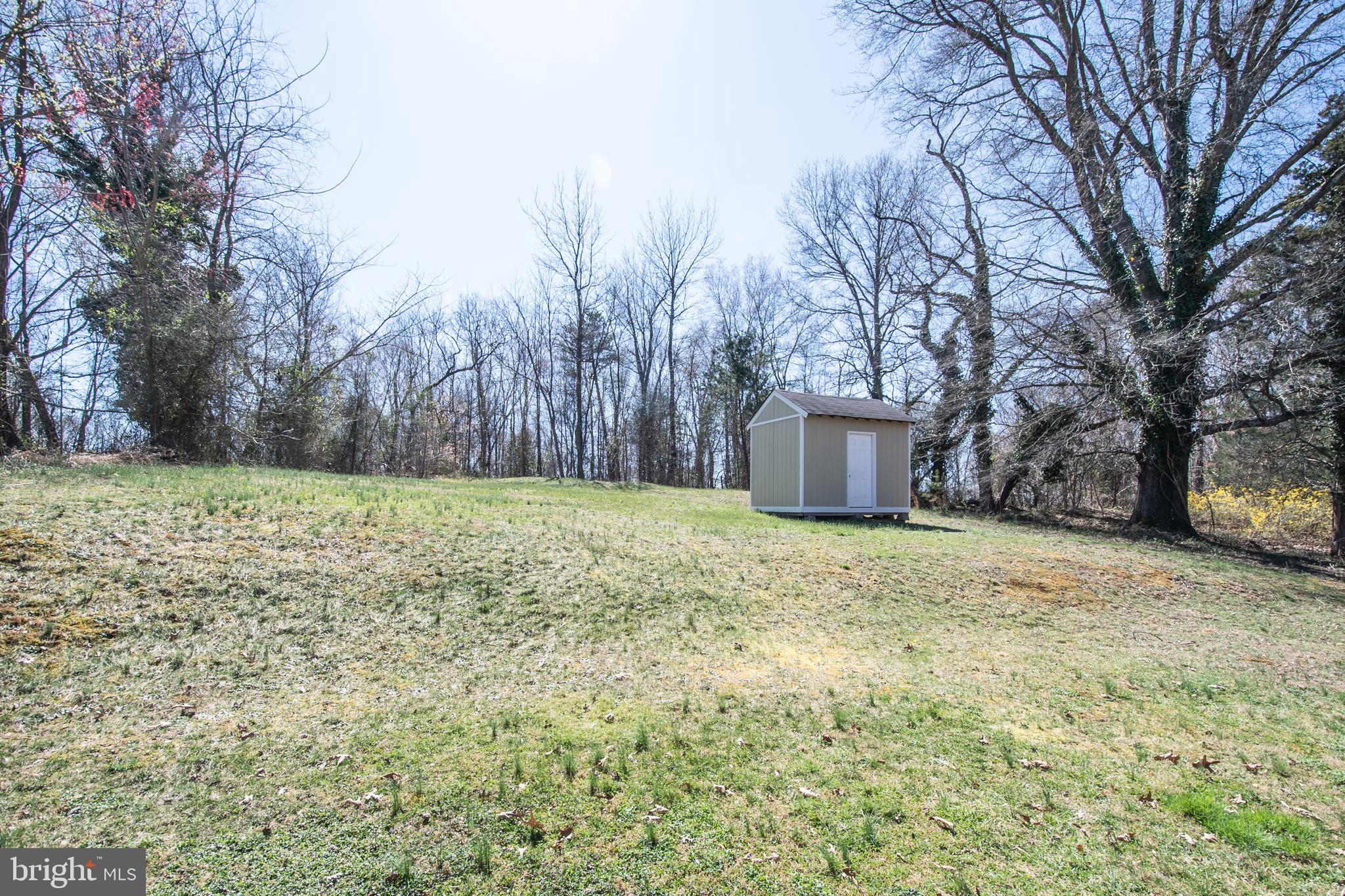 1609 Thomas Road Fort Washington, MD 20744 - Photo 4 of 27 Huge yard with with large Storage Wood shed
