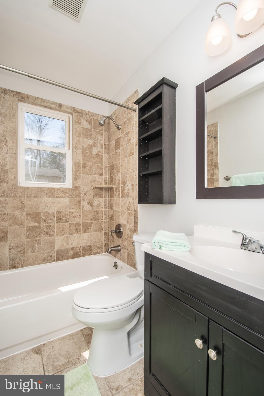 1609 Thomas Road Fort Washington, MD 20744 - Photo 10 of 27 Updated Main Hall Bathroom with Tile surround