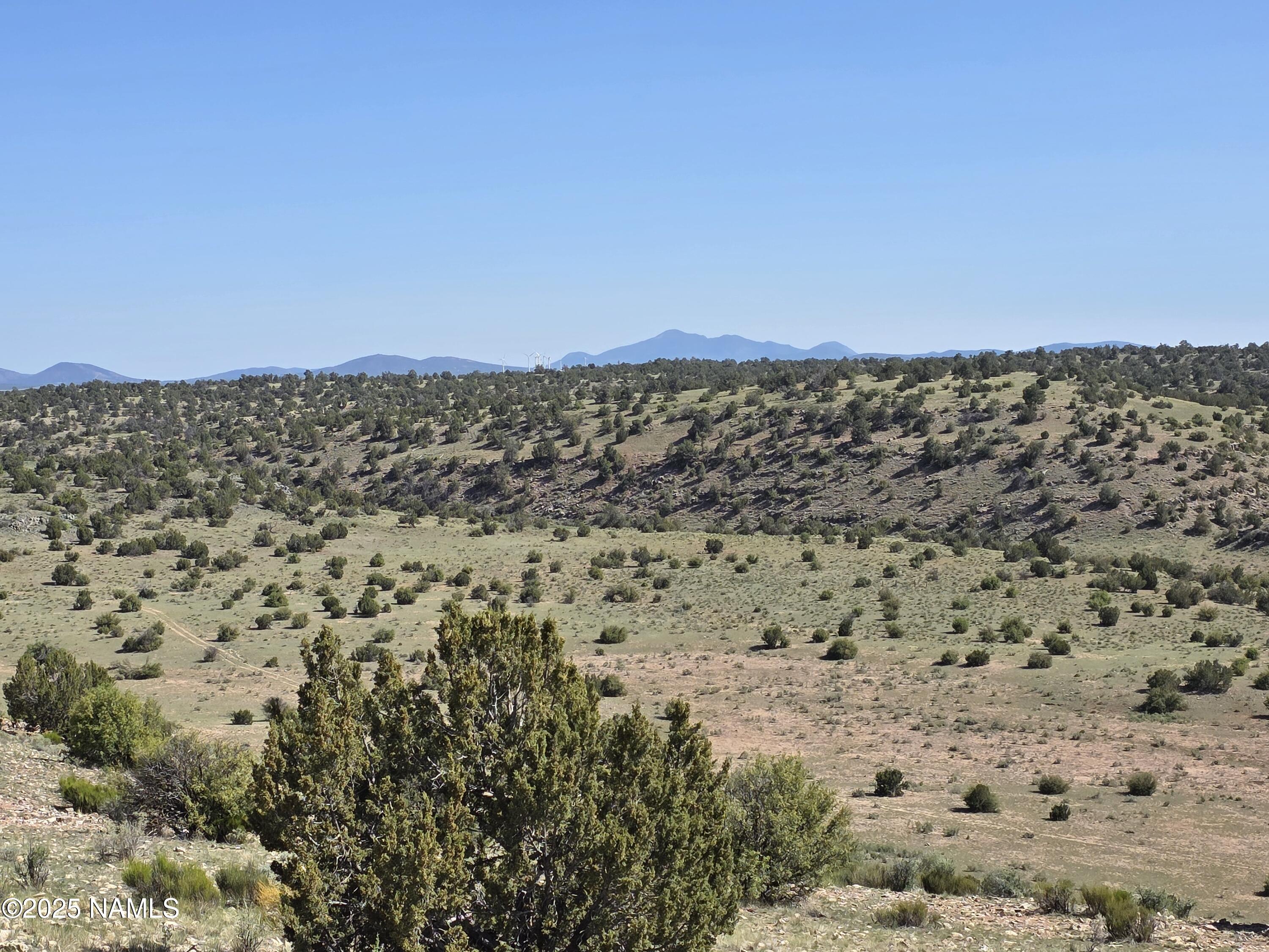 8175 Sharp Knife Road Williams, AZ 86046 - Photo 19 of 35 a view of a large building with a city view