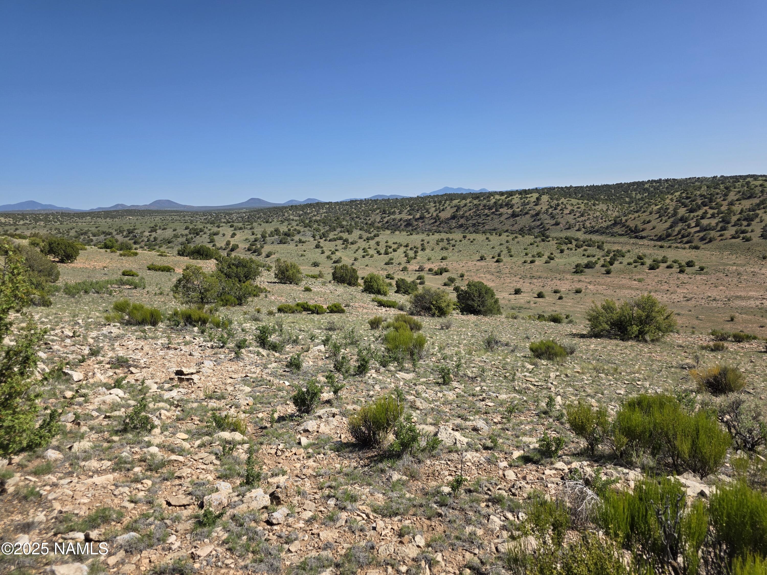 8175 Sharp Knife Road Williams, AZ 86046 - Photo 20 of 35 a view of a field with an ocean