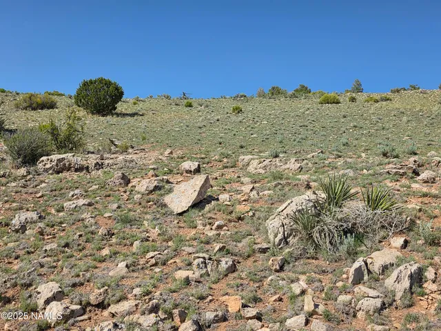 a view of mountains and valleys