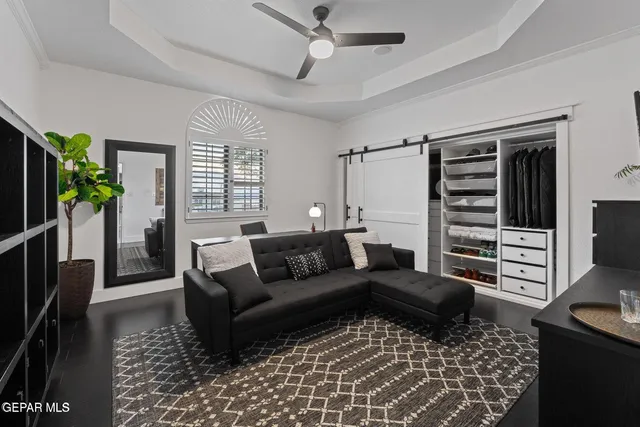 a living room with furniture and a rug