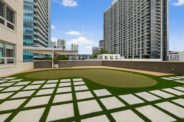 a view of swimming pool from a balcony