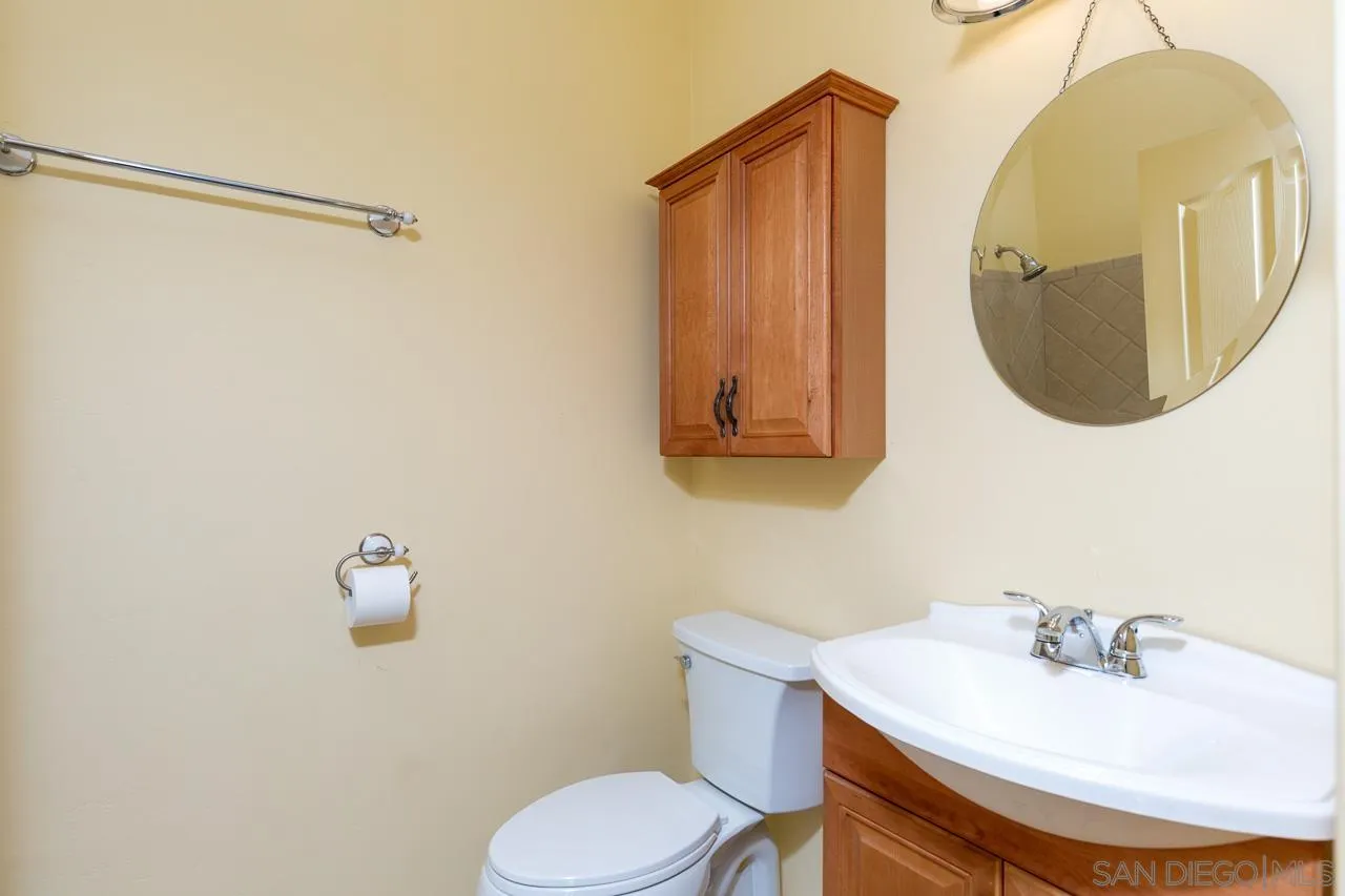 1328 Riverwood Road Santa Ysabel, CA 92070 - Photo 11 of 31 a bathroom with a sink mirror and toilet