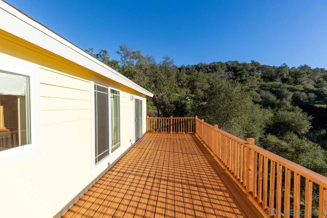 1328 Riverwood Road Santa Ysabel, CA 92070 - Photo 21 of 31 a view of balcony with wooden floor and fence