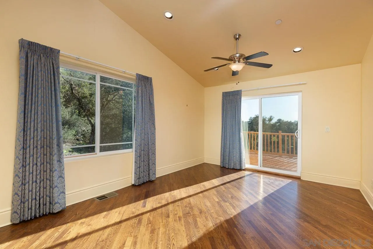 1328 Riverwood Road Santa Ysabel, CA 92070 - Photo 4 of 31 a view of a livingroom with a chandelier fan and a window