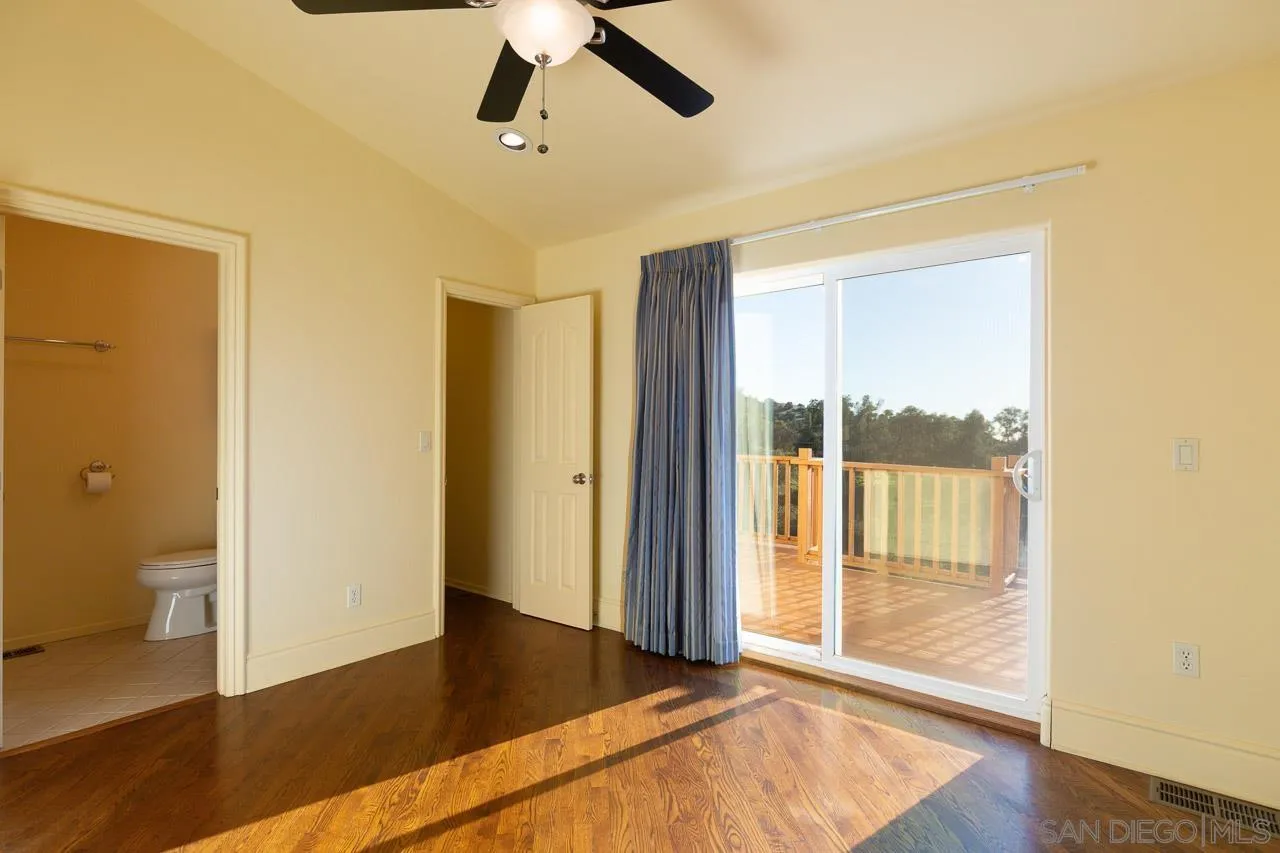 1328 Riverwood Road Santa Ysabel, CA 92070 - Photo 10 of 31 a view of a room with wooden floor and windows
