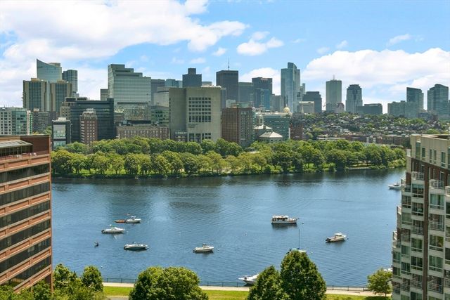 a view of a city with tall buildings