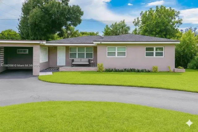 a view of a house with a swimming pool