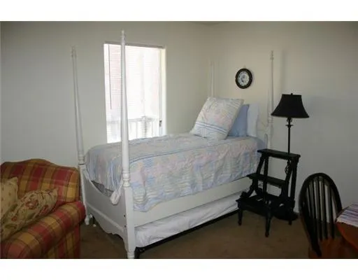 a view of swimming pool and outdoor seating