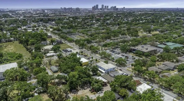 an aerial view of residential houses with city view and city view