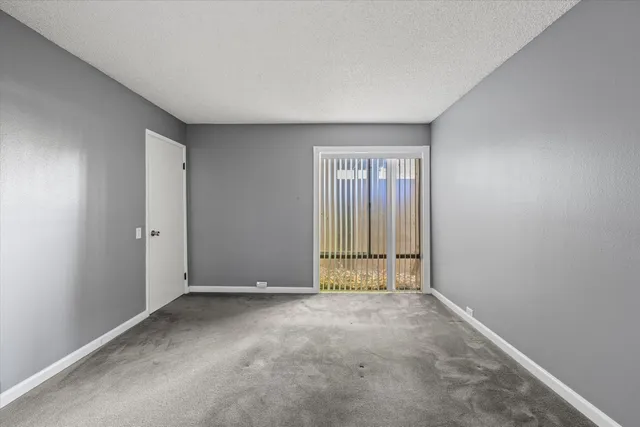 an empty room with a bathroom