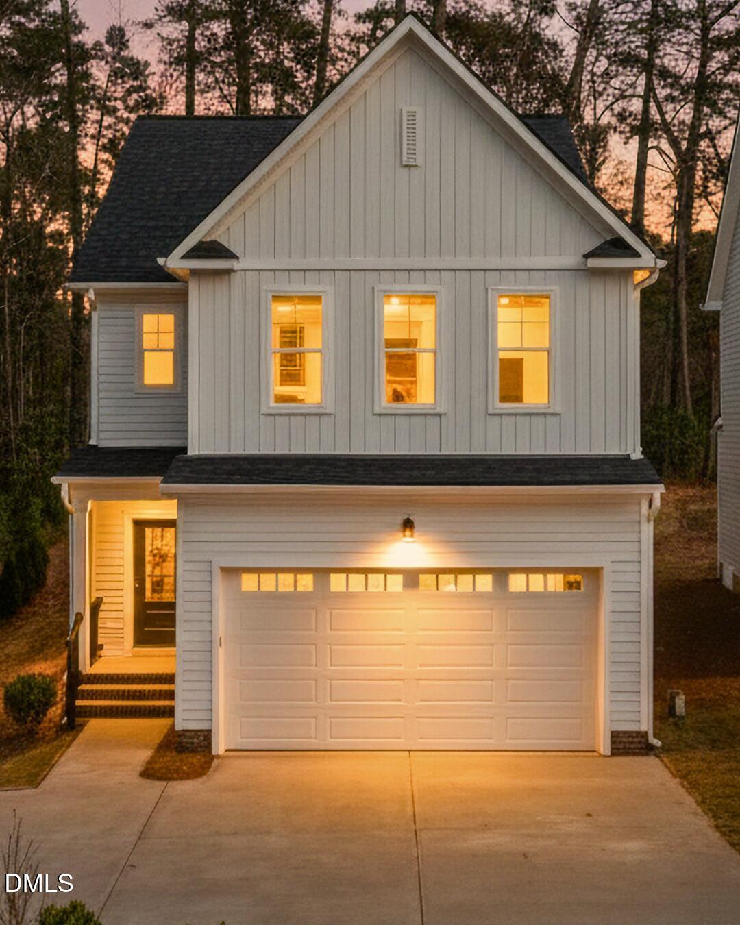 1012 Harper Road Raleigh, NC 27603 - Photo 1 of 42 a view of a house with garage