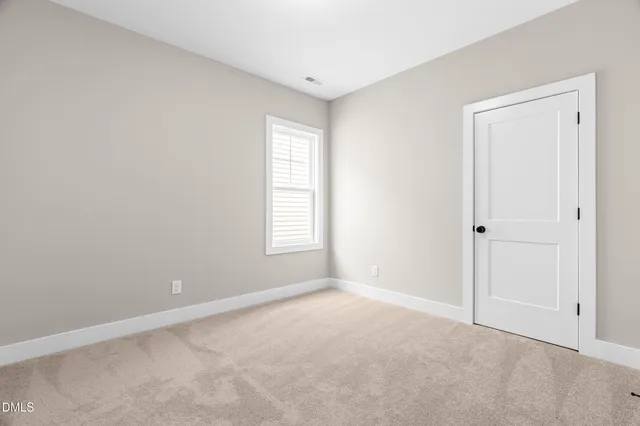 a view of a yard with palm trees