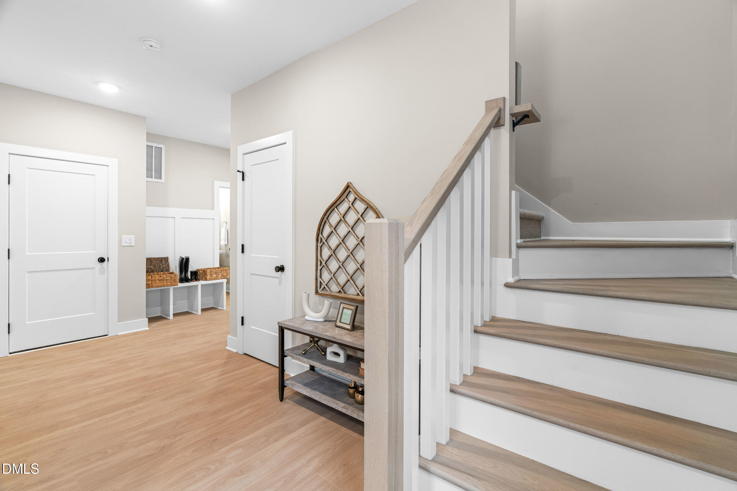 1012 Harper Road Raleigh, NC 27603 - Photo 5 of 54 a view of entryway and hall with wooden floor