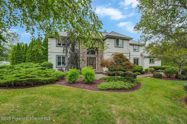 a view of a balcony with furniture