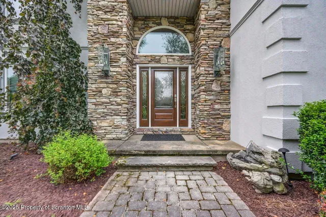 a view of a livingroom with furniture and window