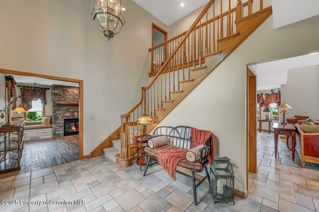 a bathroom with a toilet a sink and a shower