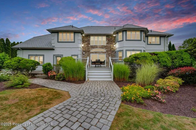 a view of a garden with an outdoor space