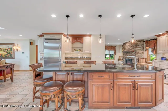 a bathroom with a toilet a sink and a shower