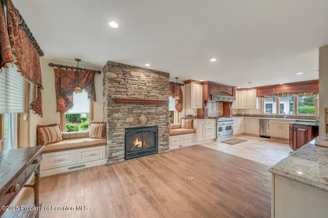 a view of a garden with a house in the background