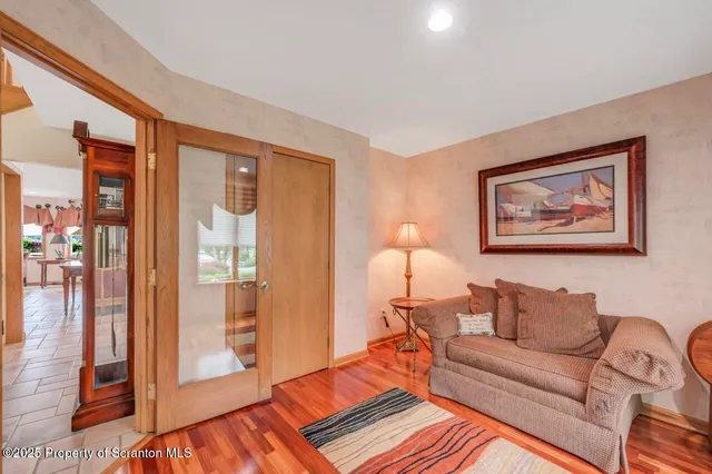 a view of a garden with a building in the background