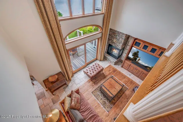 an aerial view of house with yard swimming pool and outdoor seating